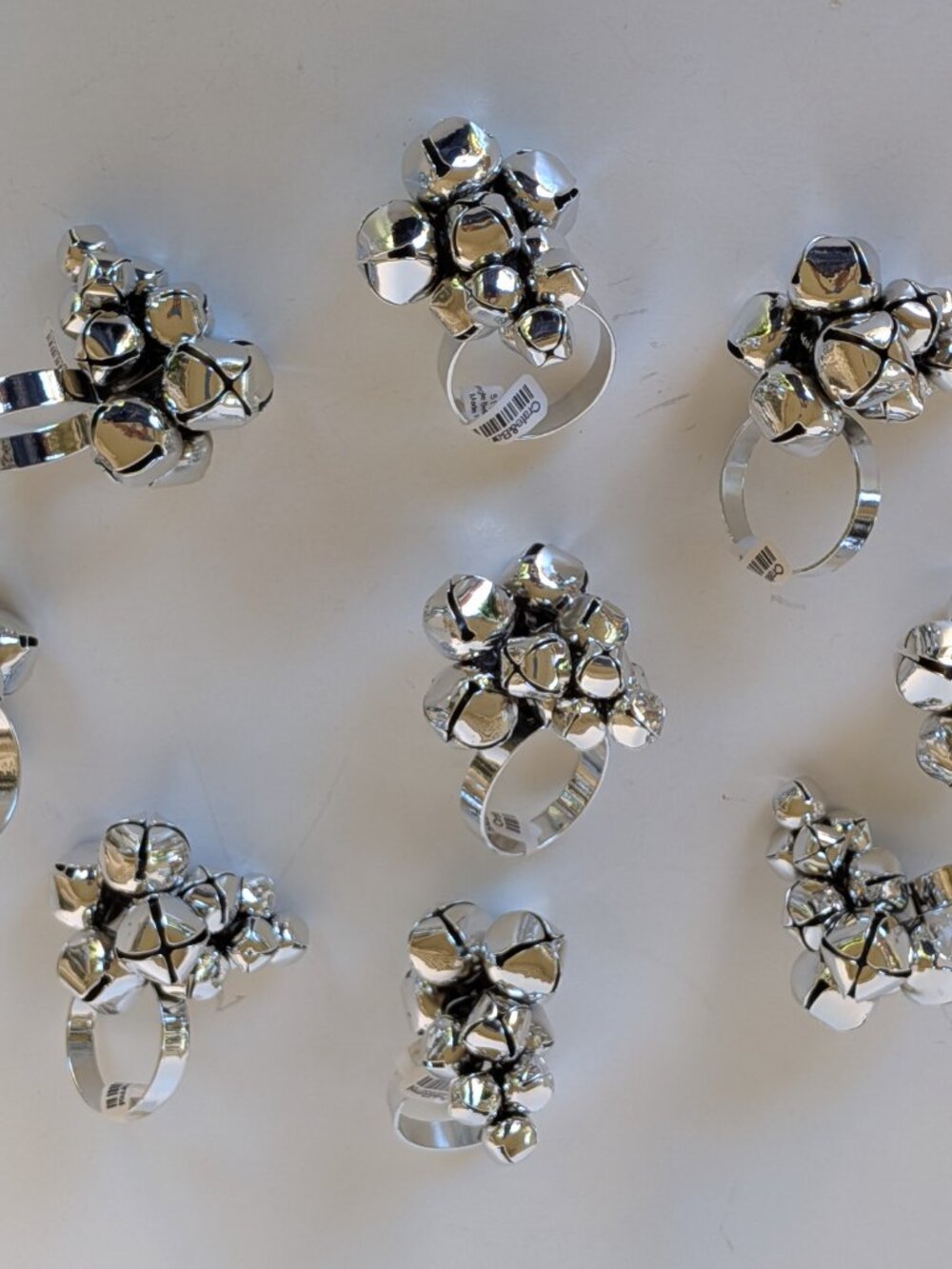 Crate & Barrel Silver Jingle Bell Napkin Rings - set of 9